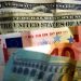 Dollar gains on tariffs fears; euro looks to ECB meeting